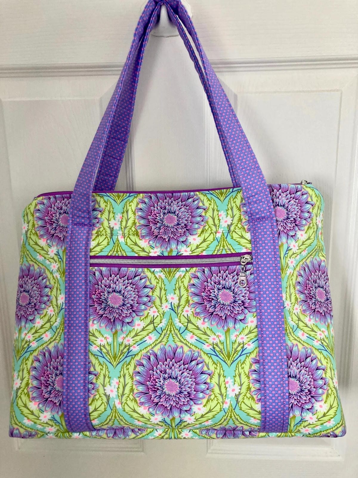 Customer handbag made using Bobbin Girl's No. 5 zipper tape in Magenta