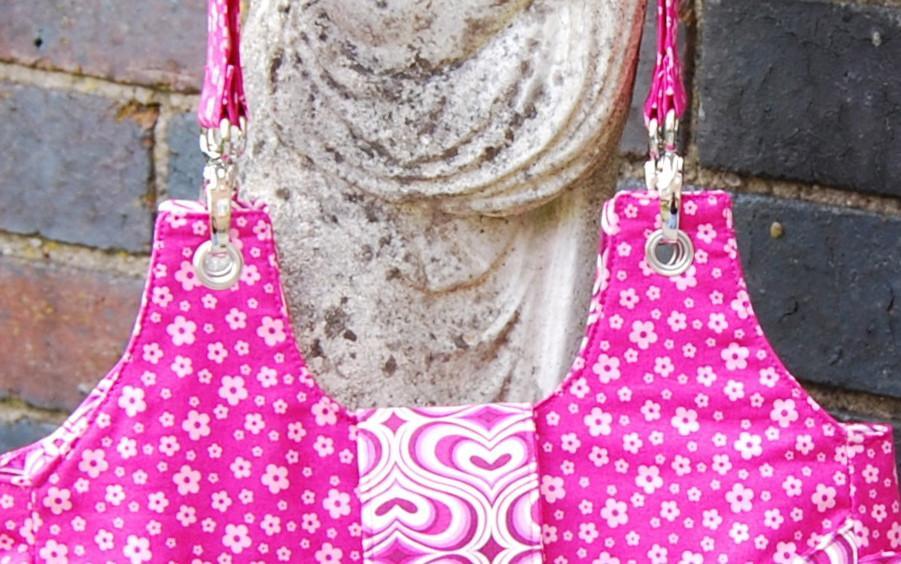 A handbag made by Bobbin Girl showing how Prym eyelets can be used to attache bag handles