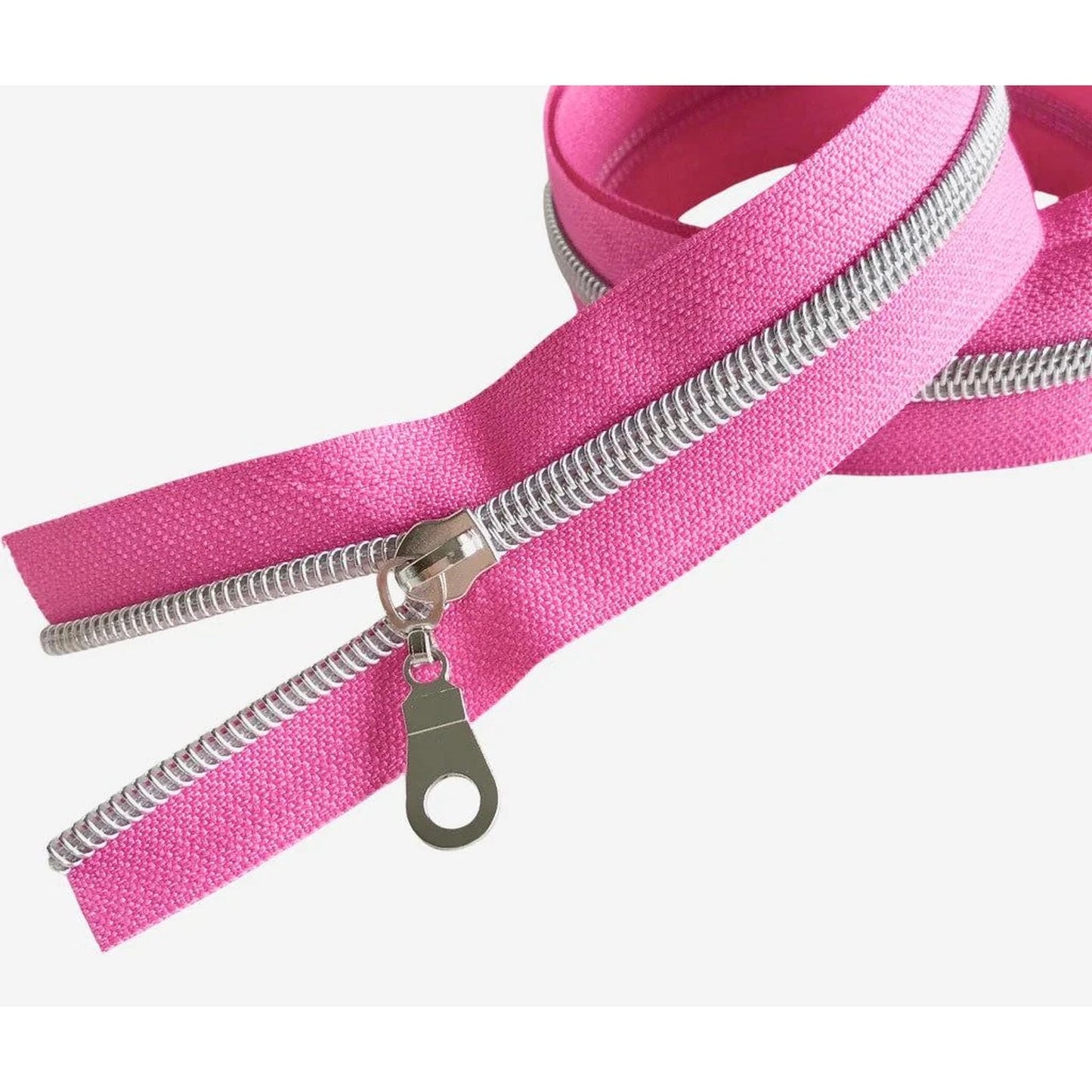 Bobbin Girl's No. 5 pink Zipper Tape is sold by the yard with 3 shiny silver zipper pulls