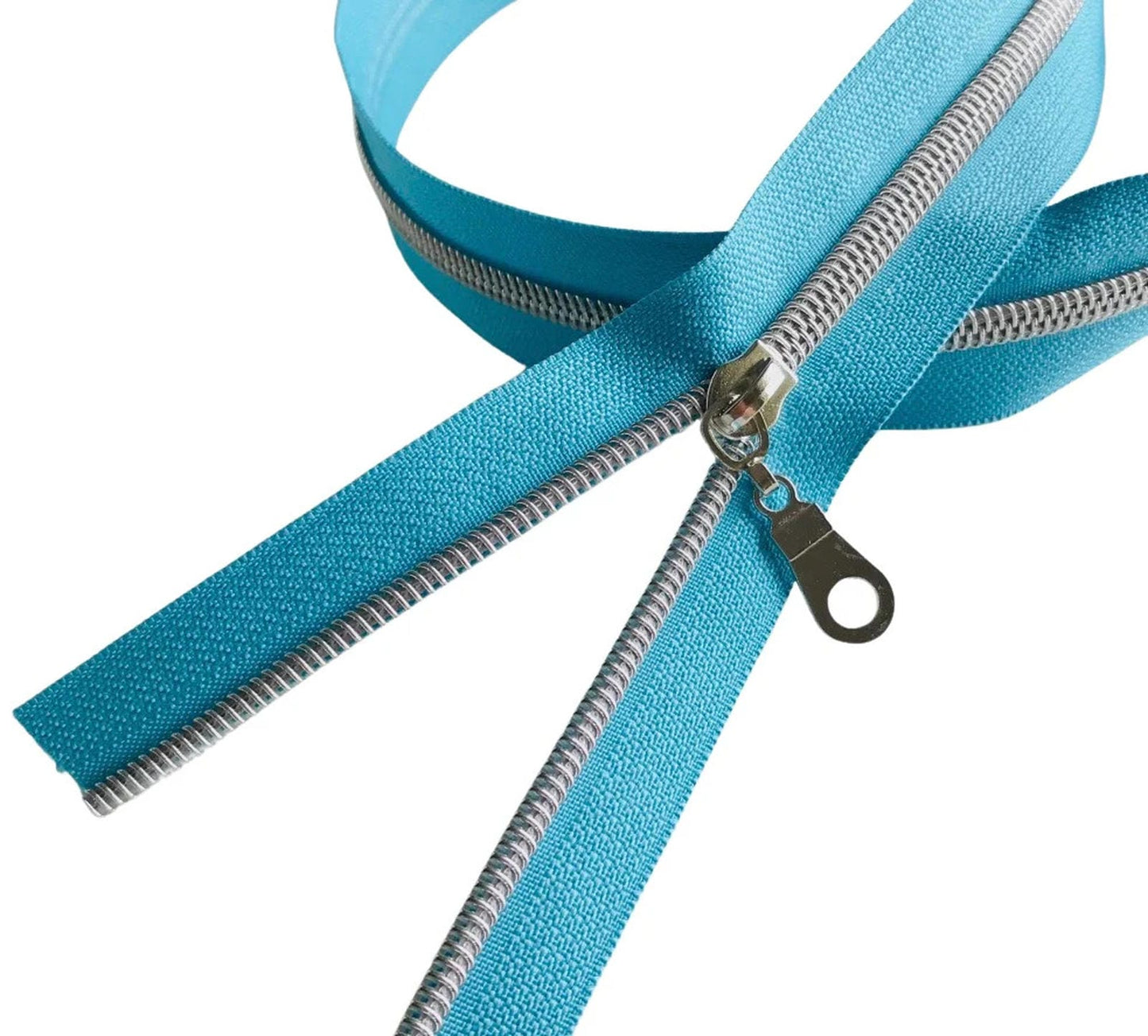 No. 5 zipper tape in mediterranean blue, sold by the yard with 3 silver donut pulls