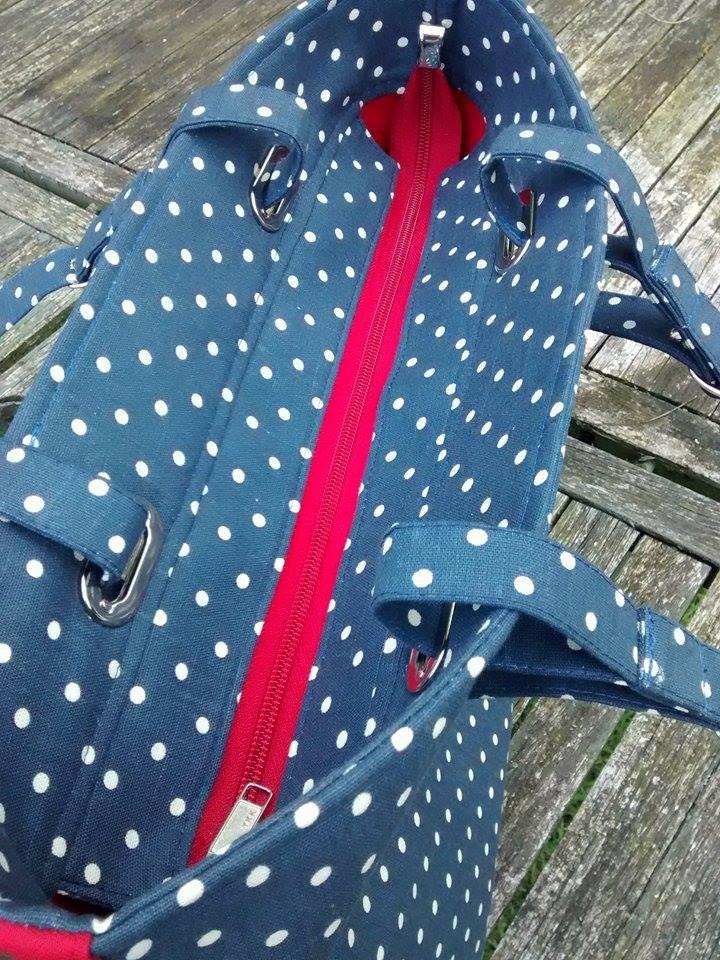 Use oval eyelets to create interest and to attach bag handles
