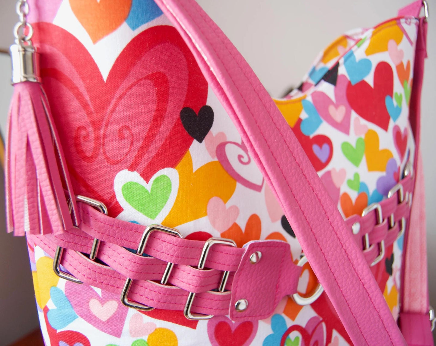 wire form rectangle rings can be used to create fancy decoration on a bag strap