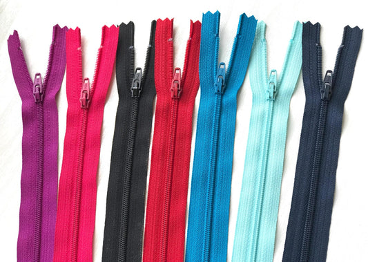 10" zips in severn different colours, magenta, hot pink, black, red, Mediterranean blue, aqua and navy 