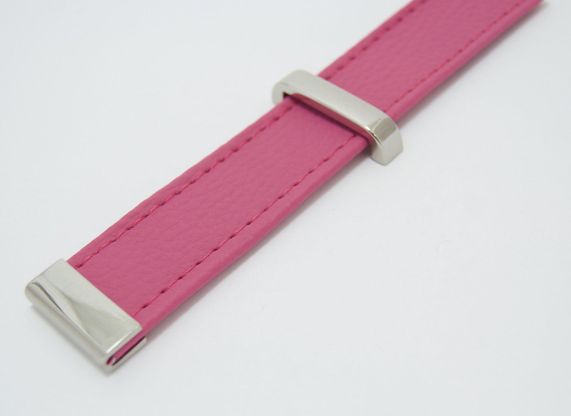 Two pack of silver strap keepers in size 25mm (1"), use to hold bag handles in place, add interest to your bag making project or as an alternative wallet closure 